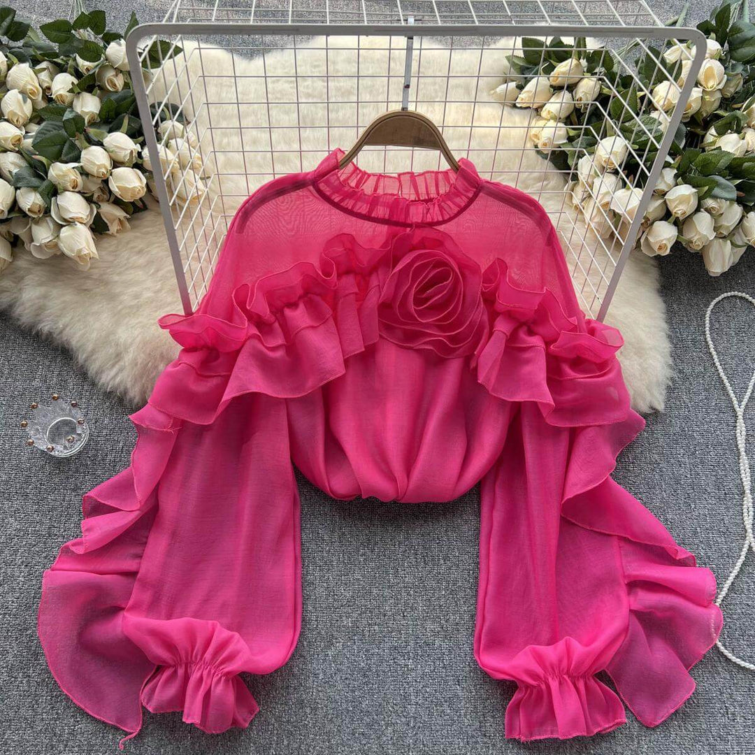 Cozy women's ruffled knit sweater, ideal for fall & winter. Long-sleeve design offers warmth and chic style.