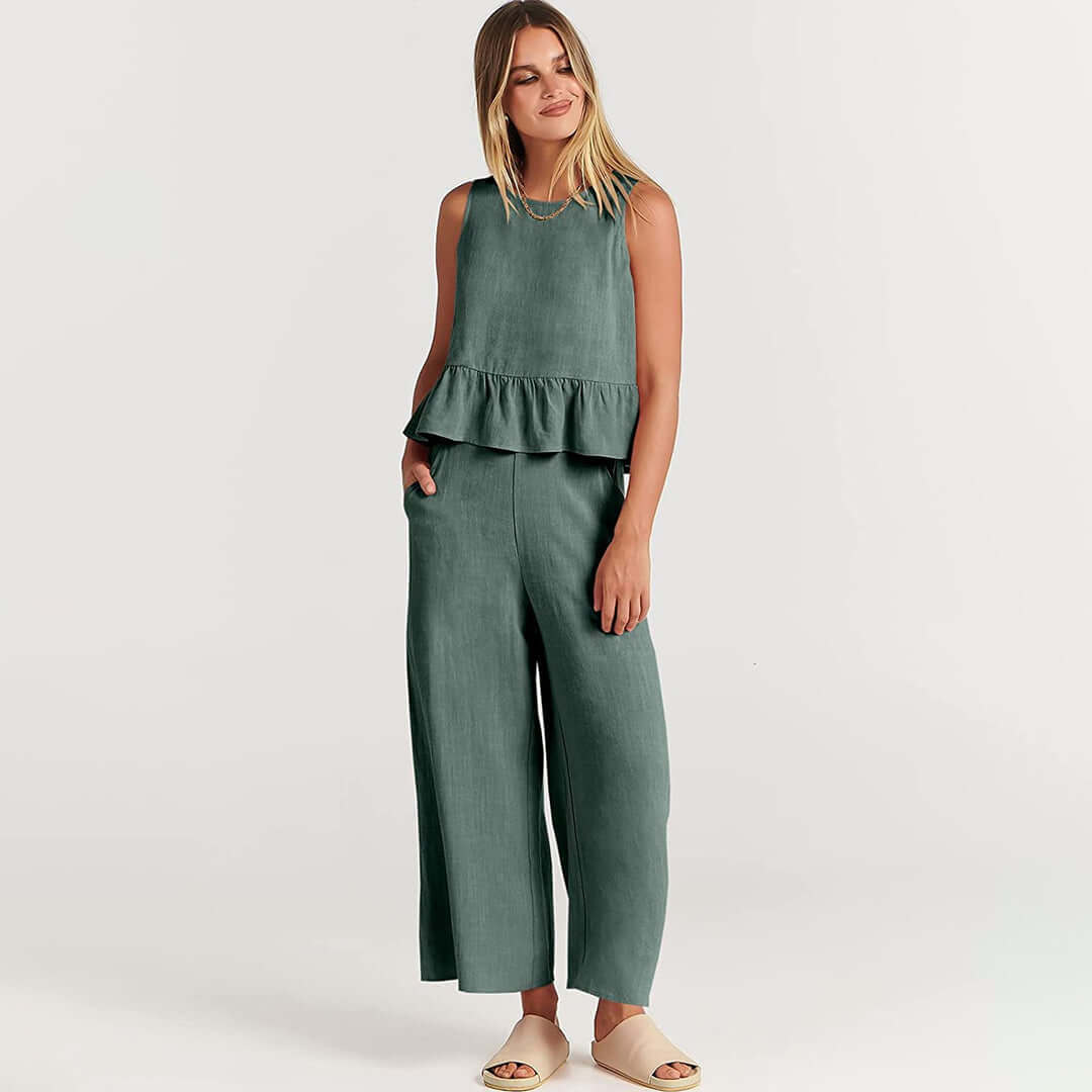 Spring fashion women's set featuring a relaxed fit ruffled top and wide-leg pants.