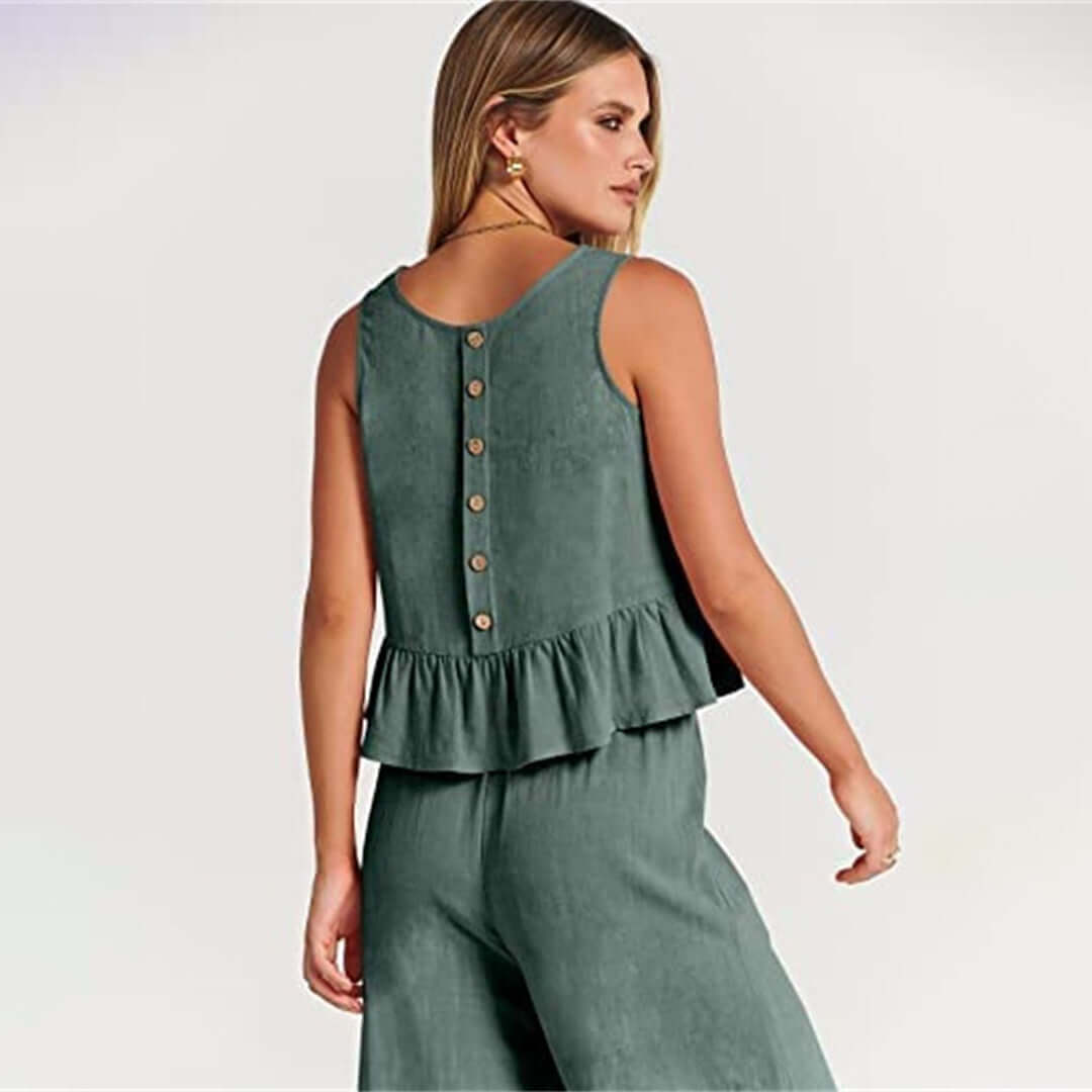 Women's comfortable clothing set: ruffled sleeveless top and wide-leg pants.