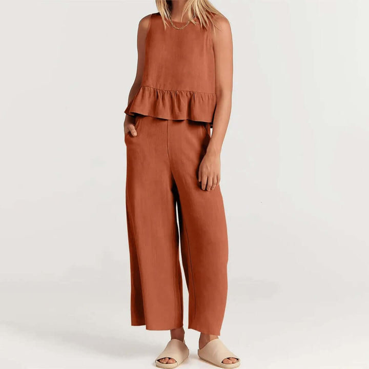 Elegant women's two-piece set: a sleeveless ruffled top & wide-leg pants, casual style.