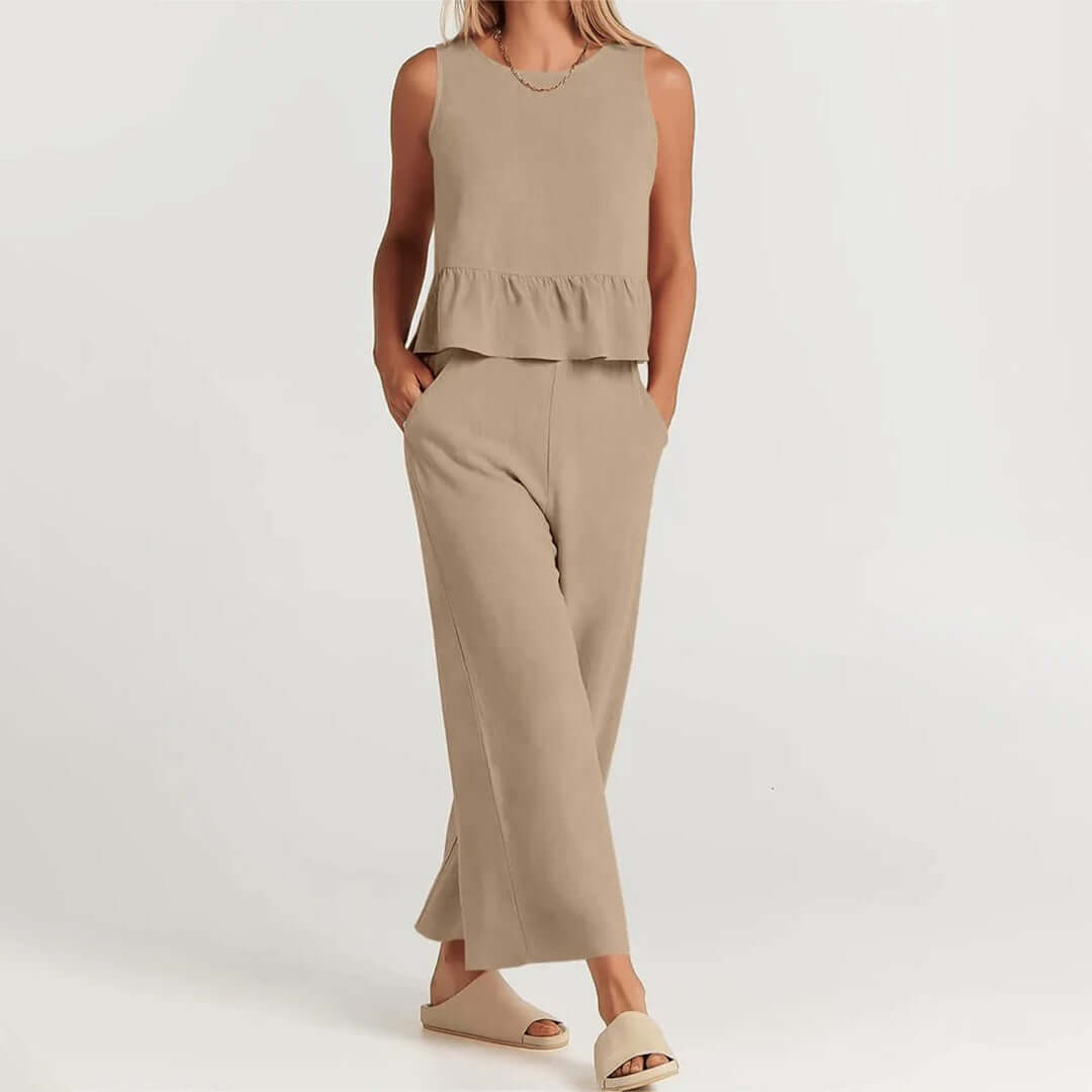 Fashionable women's spring set: a comfortable ruffled sleeveless top & wide-leg pants.