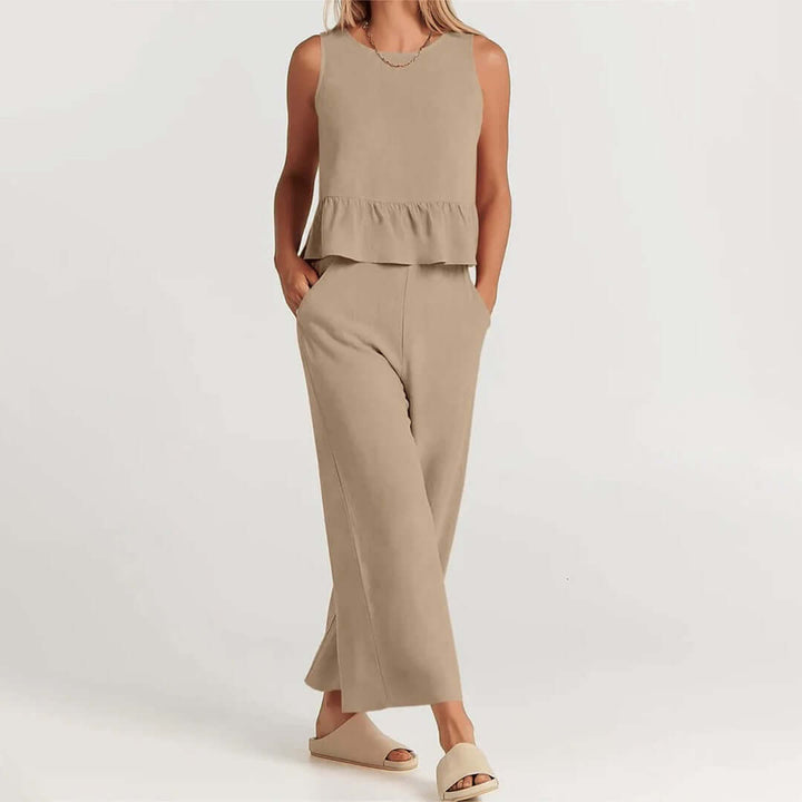 Fashionable women's spring set: a comfortable ruffled sleeveless top & wide-leg pants.