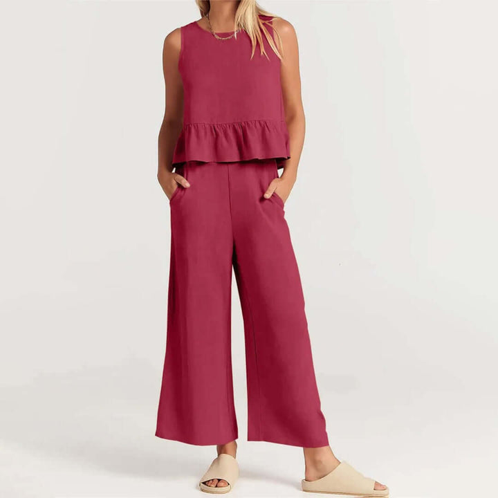 Comfortable women's set for summer, with a ruffled sleeveless top and wide-leg pants.