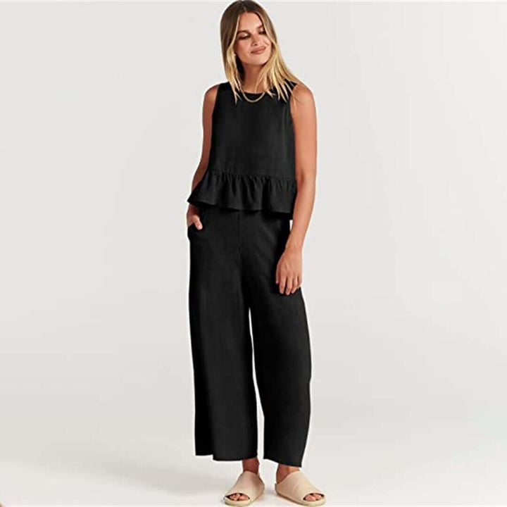 Relaxed fit women's set: a sleeveless ruffled top and comfortable wide-leg pants.