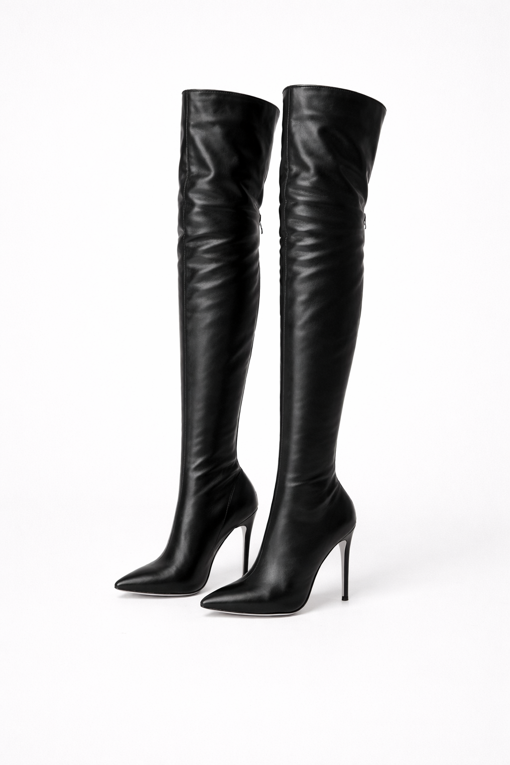 Women's scarlet thigh-high stiletto boots, an elegant over-the-knee fashion statement for parties and special occasions.