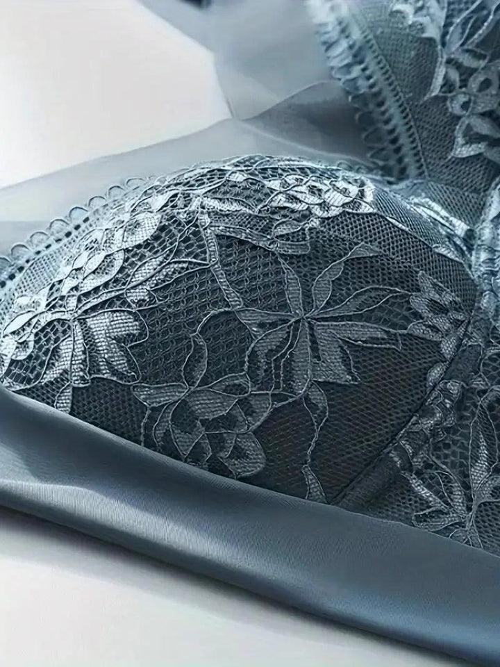 Unlined women's seamless wire-free lace bra offering light, comfortable support for sleep or leisure.