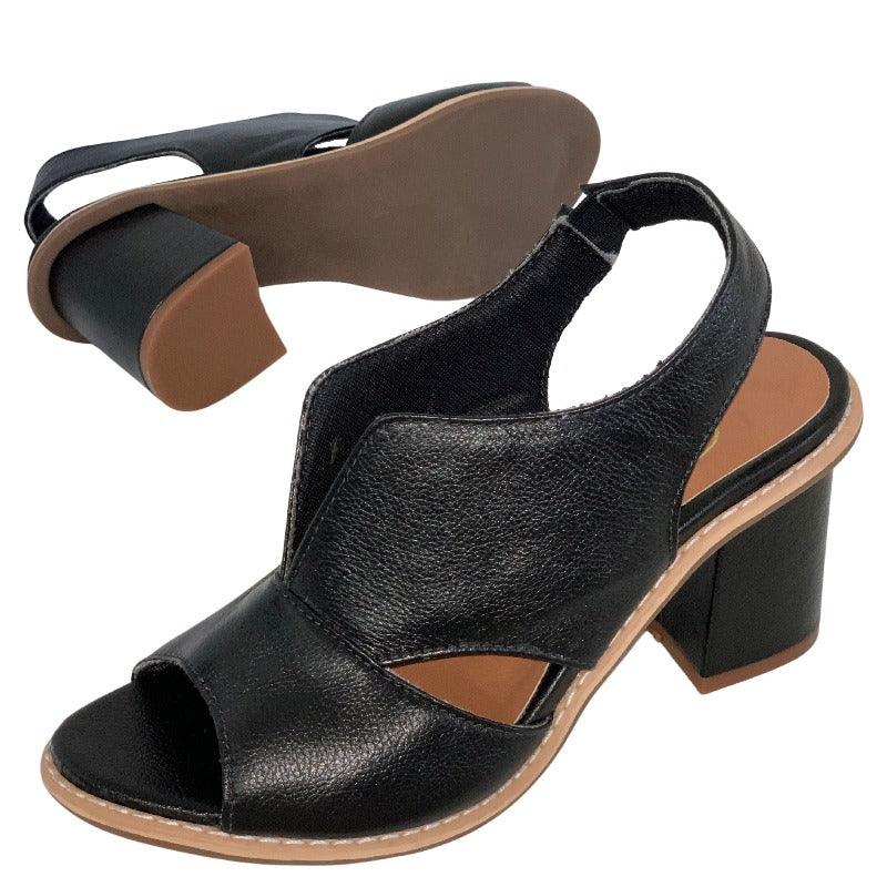 Close-up of Selina women's heeled leather sandals. Detail of buckle closure & comfortable footbed.