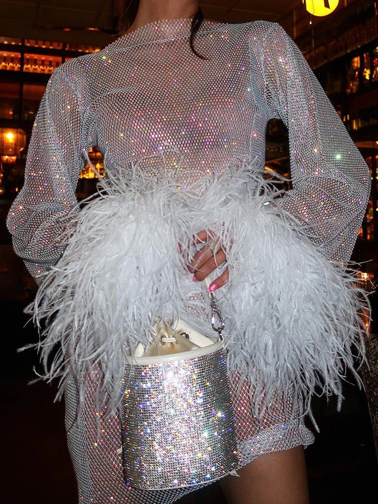 Glamorous long sleeve mini party dress for women, featuring a stunning shimmer & chic feather cuffs.