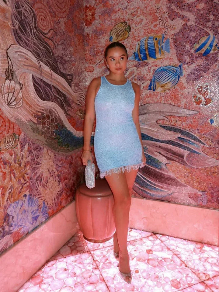 Chic sequin mini cocktail dress for women, offering a shimmering and elegant look for special occasions.