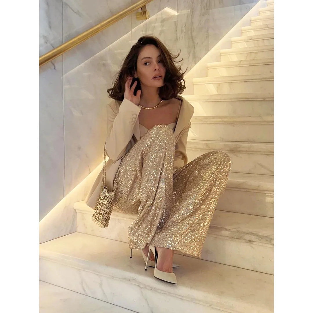 Elegant women's sequin pants in shimmering metallic, perfect for festive parties, holidays, and evening glam.