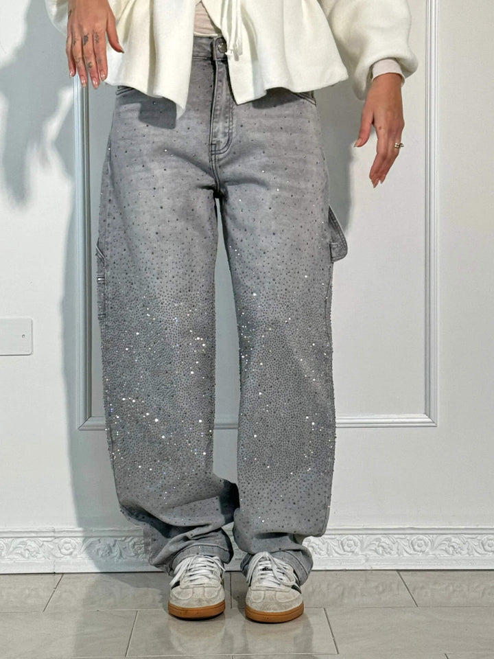 Trendy women's shiny balloon carpenter jeans. Relaxed fit, glitter details, perfect statement piece for fashion.