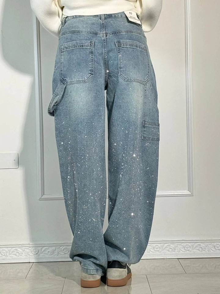 Casual chic women's shiny jeans. Balloon leg, carpenter style, and glitter detail for sparkling fashion bottoms.