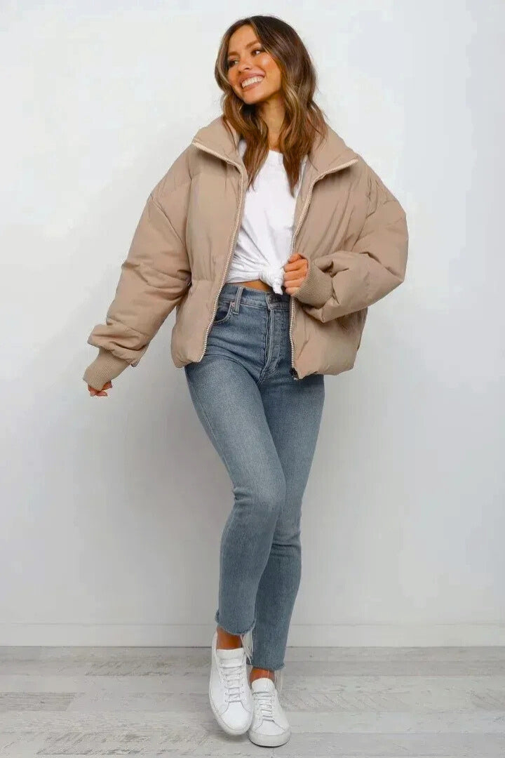 Casual women's short puffer jacket, quilted pattern, zip front, essential winter layering piece.