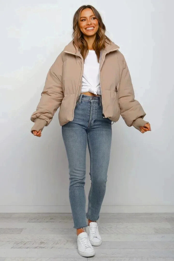 Women's zip-front quilted short puffer jacket, trendy design for cool weather & daily wear.