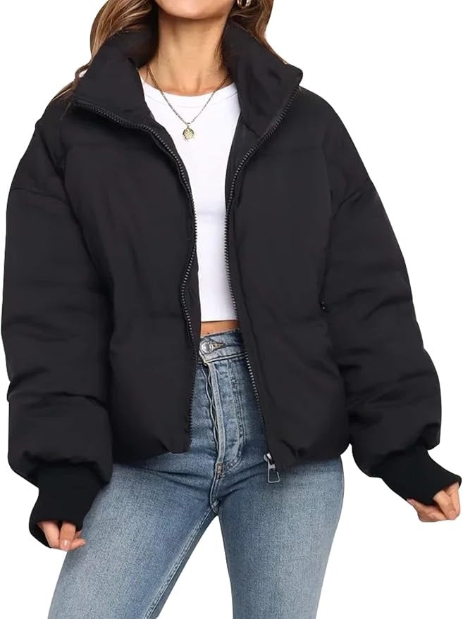 Stylish women's quilted short puffer jacket with a secure zip closure, great for fall/winter.