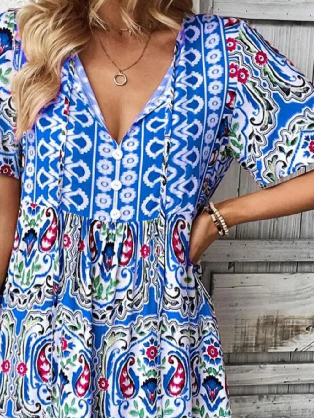 Stylish women's short sleeve summer mini dress. Ideal for casual outings, parties, or vacation.