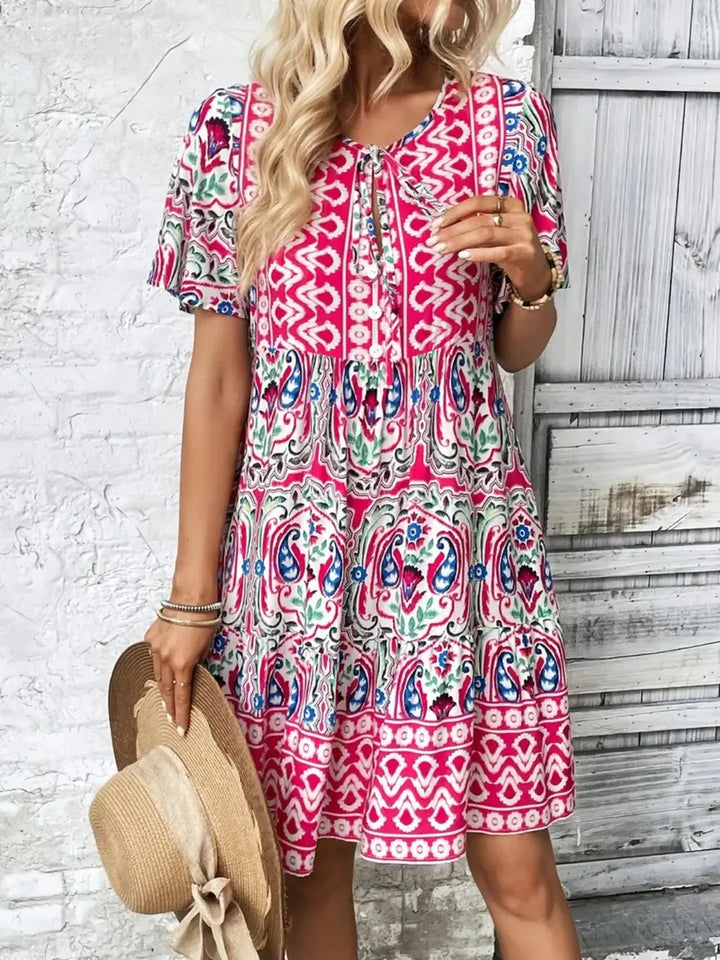 Casual women's short sleeve summer mini dress. Versatile and chic for warm weather.