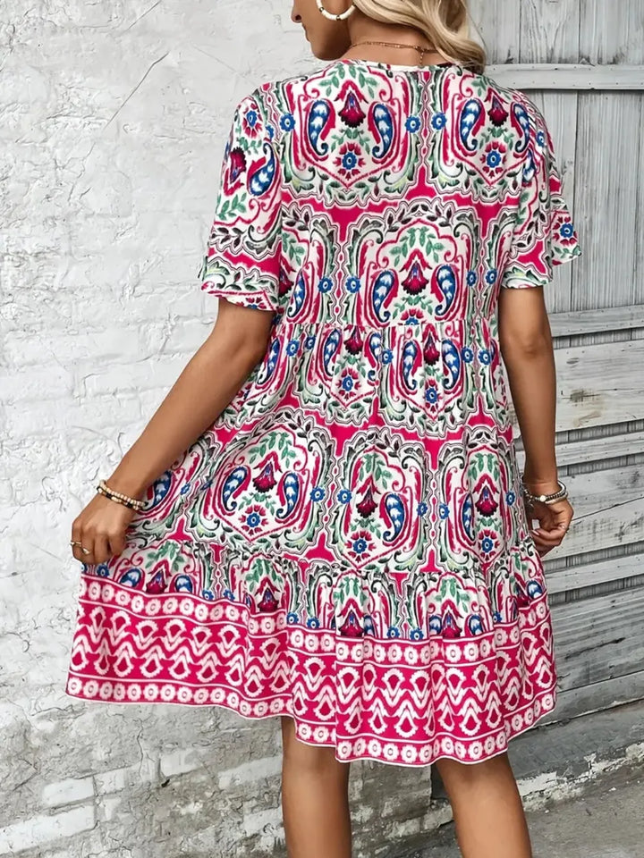 Chic women's summer mini dress, short sleeves, for effortless style. Great for parties & casual days.