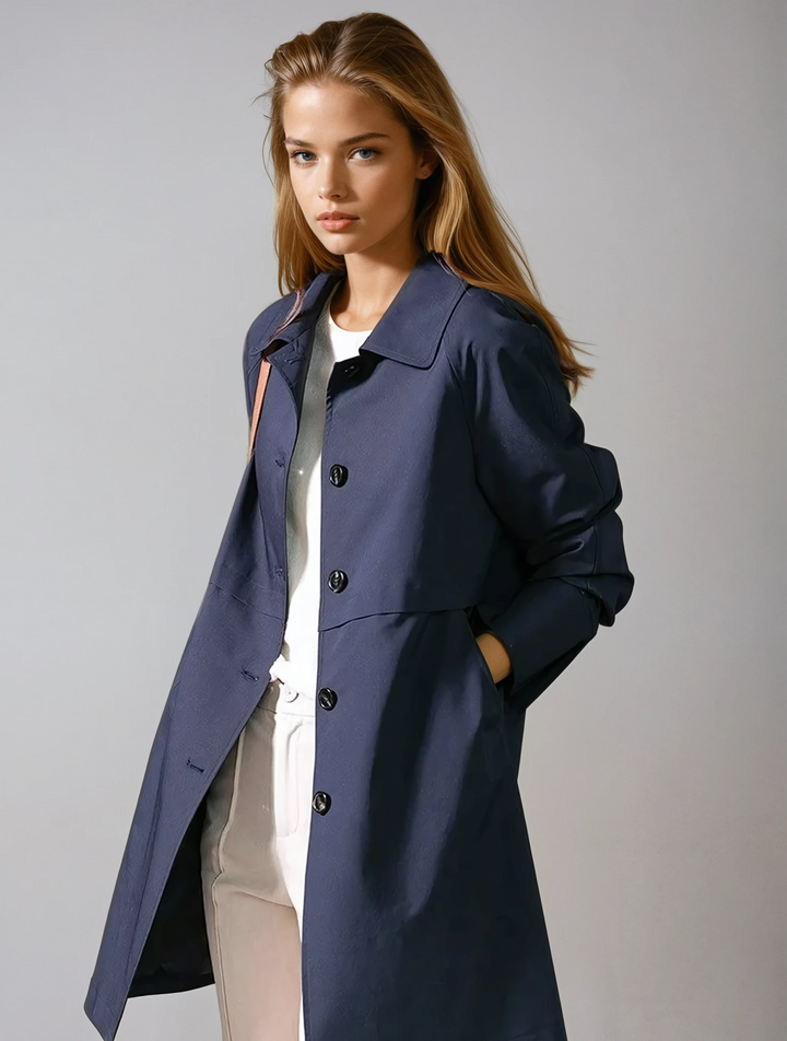 Women's short trench coat with button-up front. Timeless, elegant fall/spring outerwear.