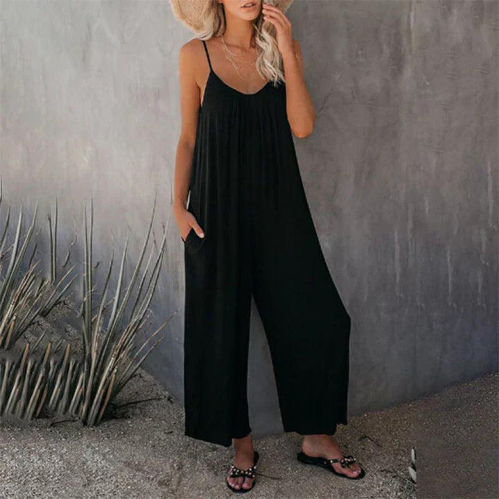 Elegant women's sleeveless jumpsuit, designed with a loose fit and convenient pockets. A fashionable, versatile summer outfit.