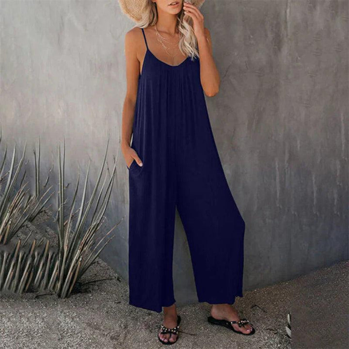 Comfortable women's sleeveless loose jumpsuit, great for relaxed summer days. Features practical pockets & chic casual style.