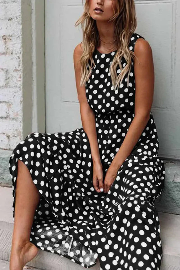 Women's summer fashion sleeveless polka dot maxi dress, a versatile and flowy vacation essential.