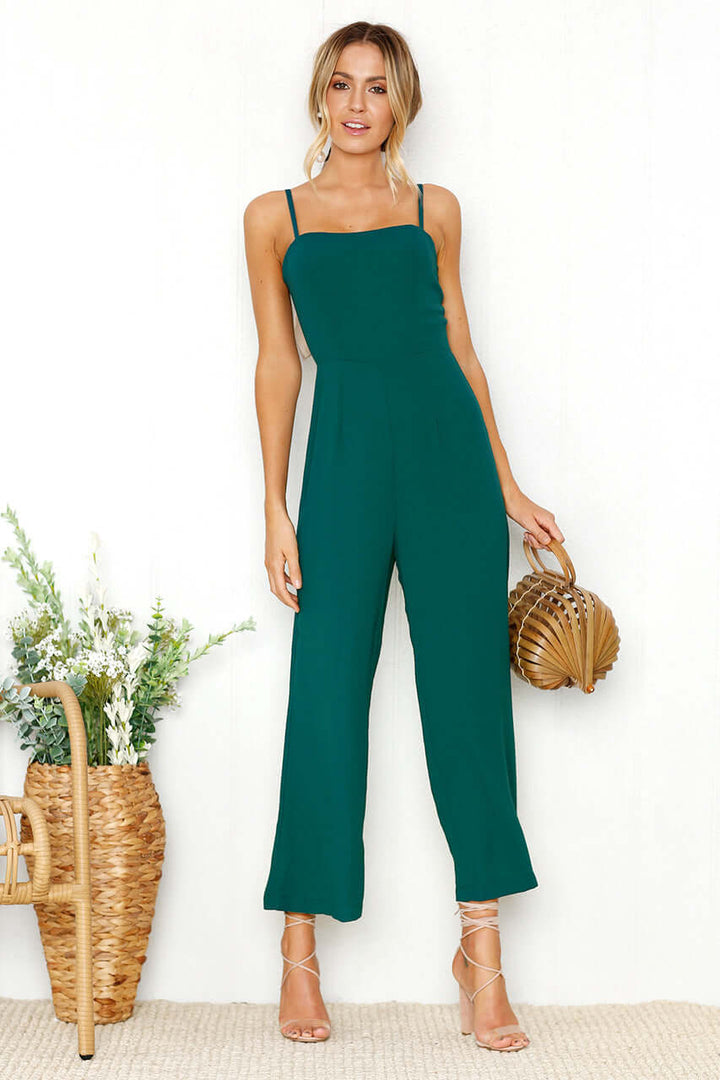 Comfortable women's sleeveless straight leg jumpsuit, polyester blend, ideal for summer style.