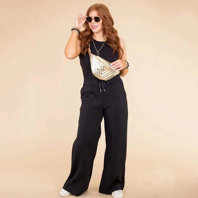 Versatile women's sleeveless wide-leg jumpsuit for casual or elegant occasions. Comfortable summer fashion.