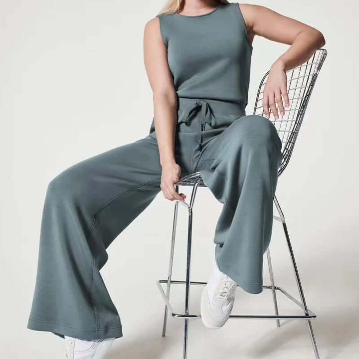 Elegant women's sleeveless wide-leg jumpsuit with a flattering round neck. A comfortable and stylish summer outfit.
