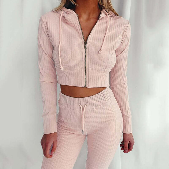 Comfortable women's slim fit hoodie tracksuit, versatile for casual, active, or athleisure wear.