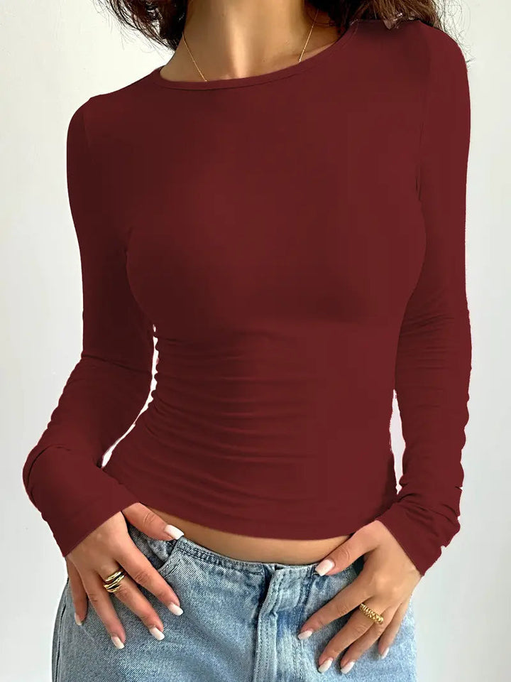 Essential women's basic slim fit long sleeve top. A foundational piece for any chic wardrobe.