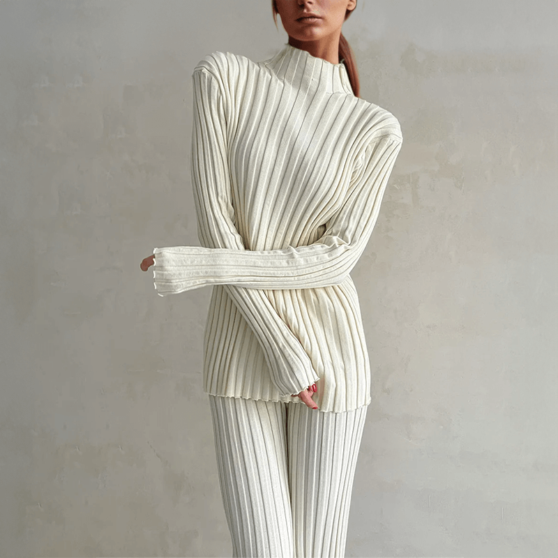 Women's slim fit ribbed knit two-piece set, featuring a chic turtleneck top and matching comfortable knit trousers.