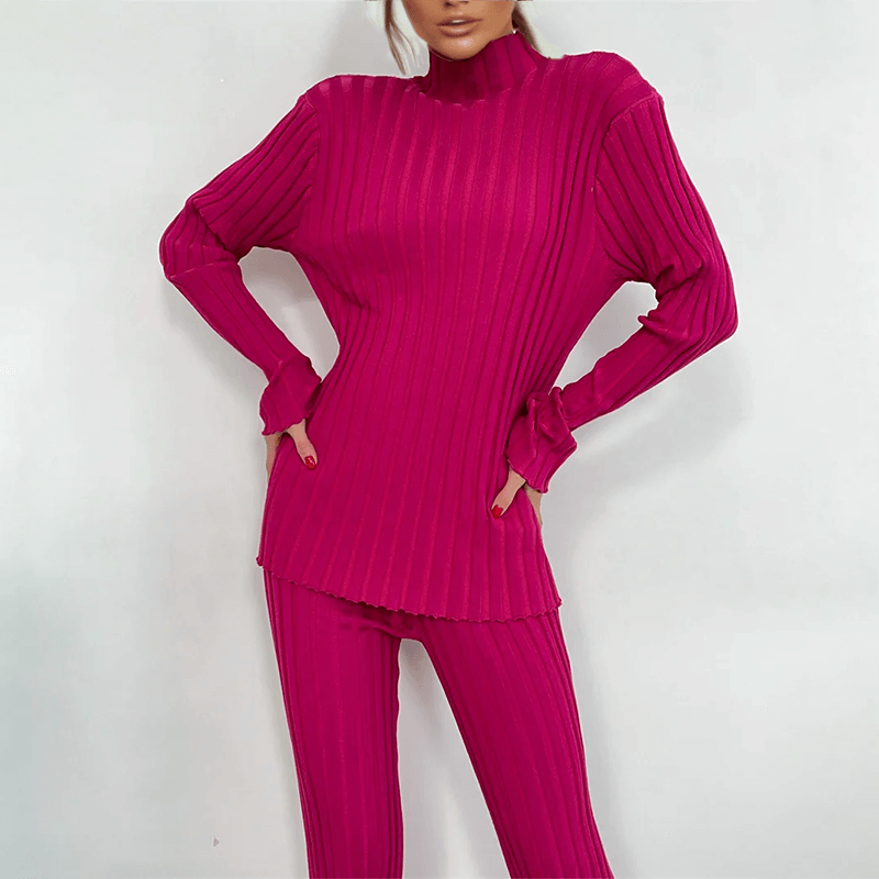 Versatile women's slim fit ribbed knit two-piece set; elegant turtleneck and comfy knit trousers for any occasion.