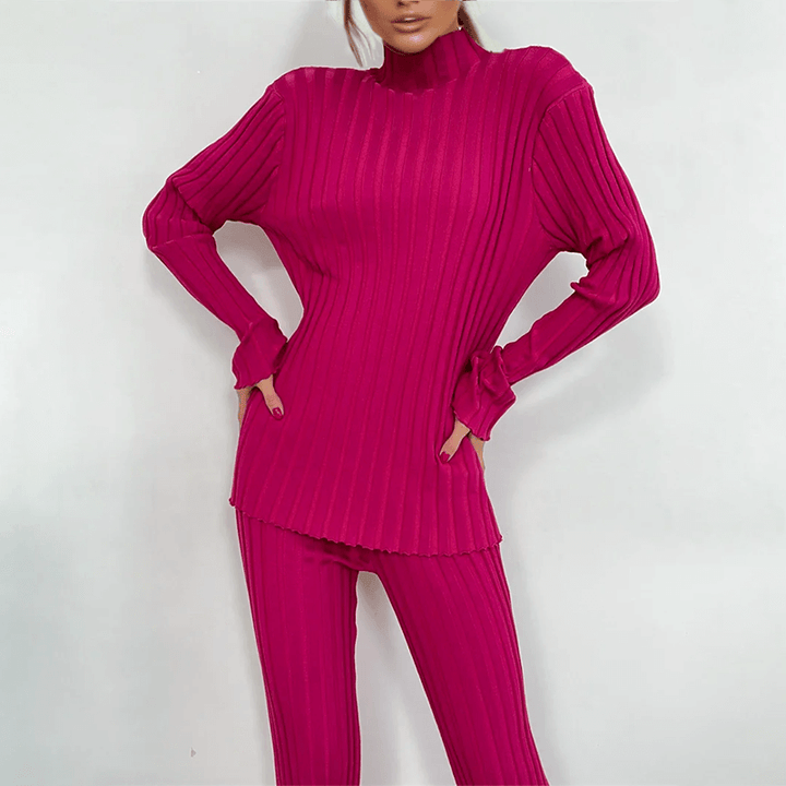 Versatile women's slim fit ribbed knit two-piece set; elegant turtleneck and comfy knit trousers for any occasion.