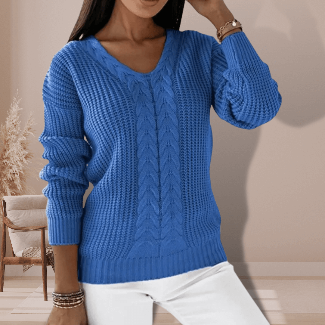 Cozy soft knit women's V-neck pullover sweater. Long-sleeve polyester slim fit top for comfortable everyday wear.