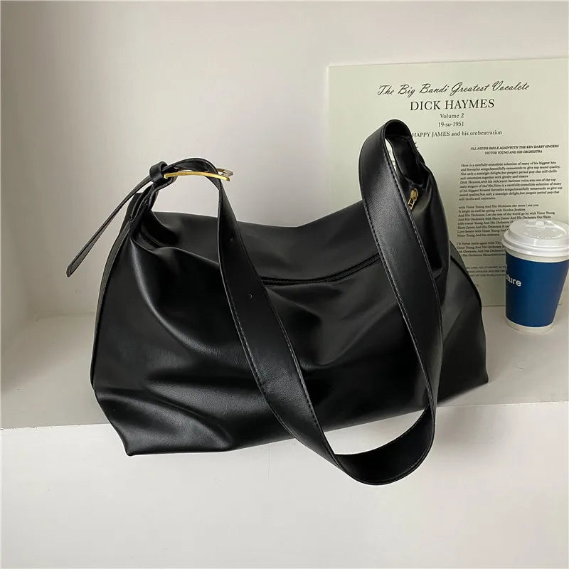 Stylish women's shoulder bag: a versatile slouchy tote for fashion-forward everyday carry.