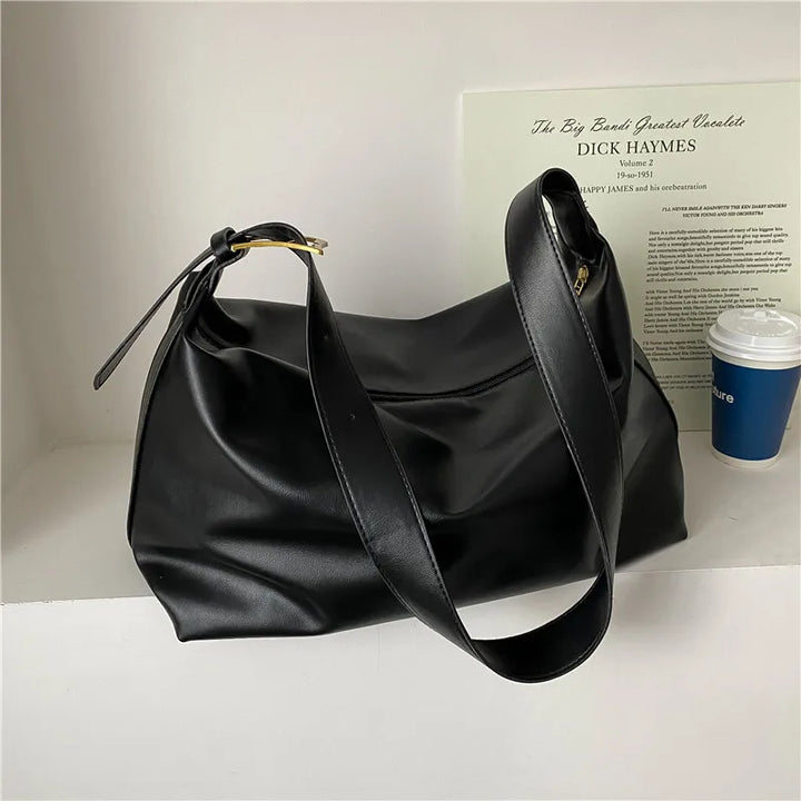 Stylish women's shoulder bag: a versatile slouchy tote for fashion-forward everyday carry.
