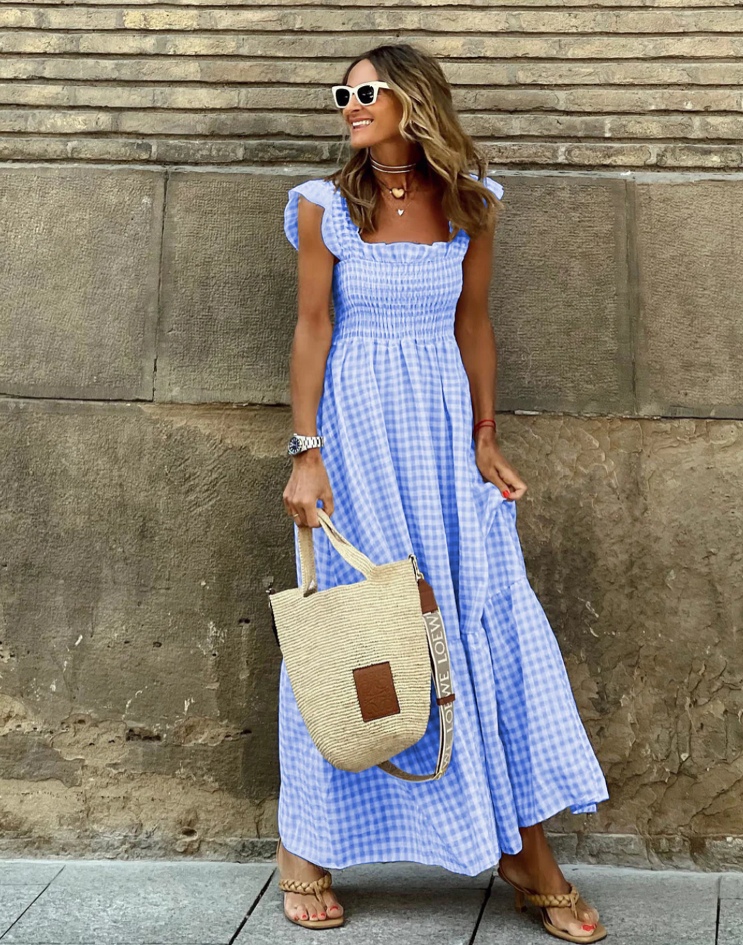 Flattering women's smocked gingham maxi dress, long & flowy with pretty ruffle sleeves, chic summer fashion.