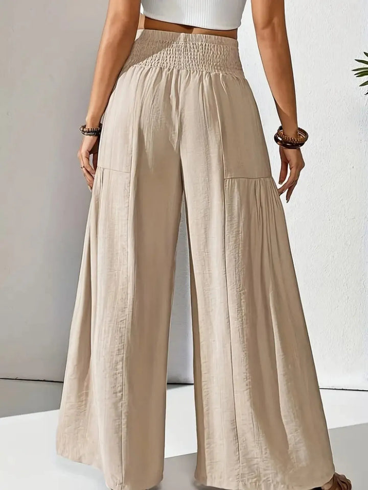 Comfortable high waist wide leg pants for women, smocked elastic waist, loose fit for everyday style.