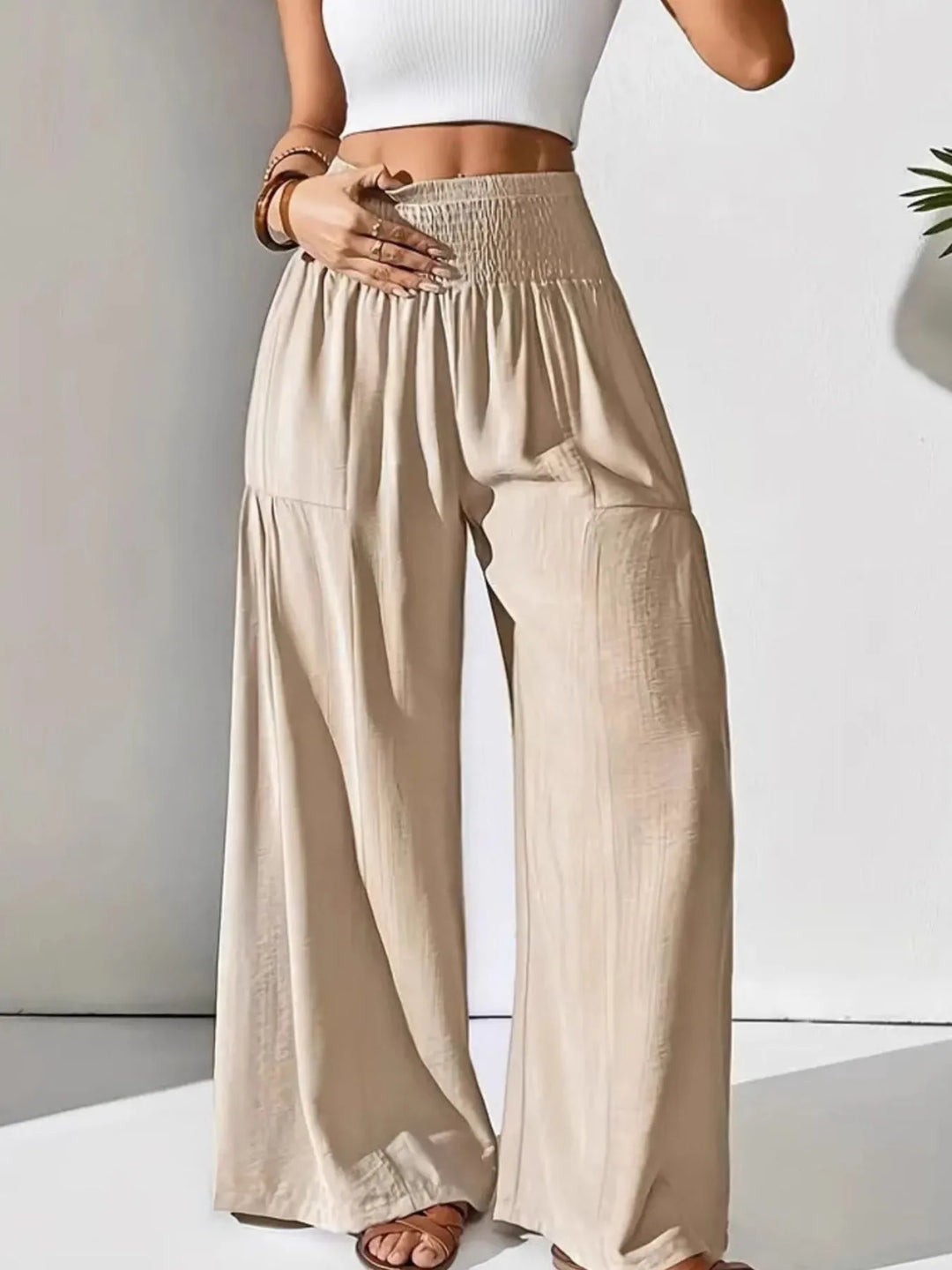 Stylish women's wide leg pants with smocked waist, ideal for a relaxed, flowy, and casual look.