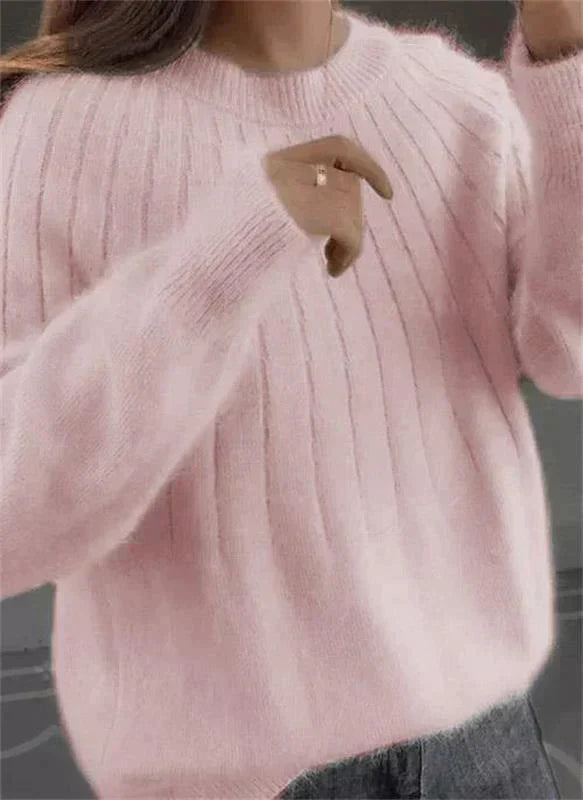 Cozy women's knit pullover sweater, perfect for autumn & winter comfort. Elegant long sleeve design.