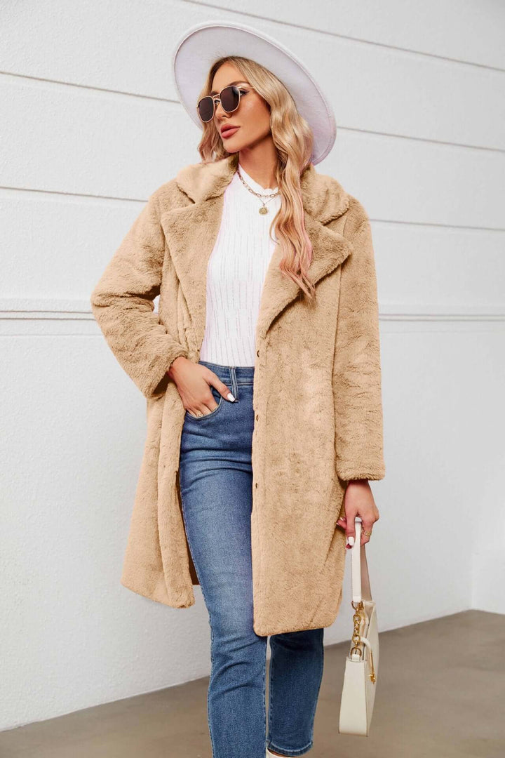 Luxurious cruelty-free faux fur long coat for women, featuring a stylish lapel. A warm & soft teddy jacket for winter.