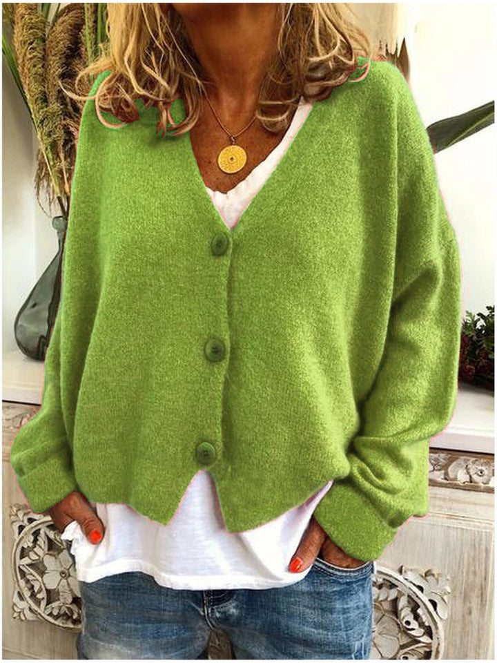 Relaxed fit women's v-neck cardigan, a cozy soft knit perfect for fall and winter layering.