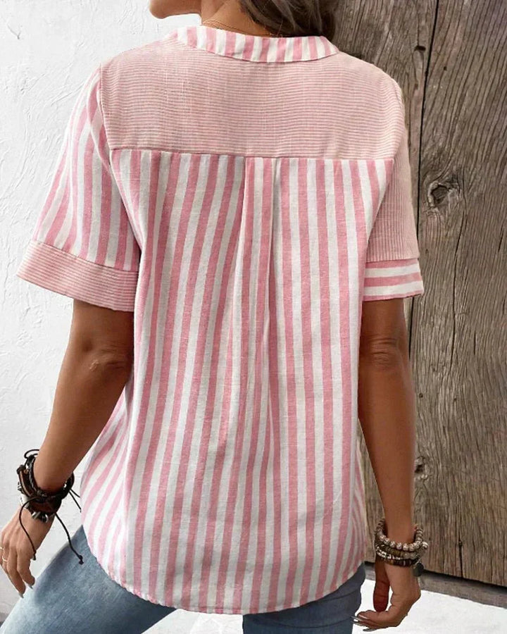 Relaxed fit women's striped shirt made with soft fabric for ultimate comfort and modern elegance.