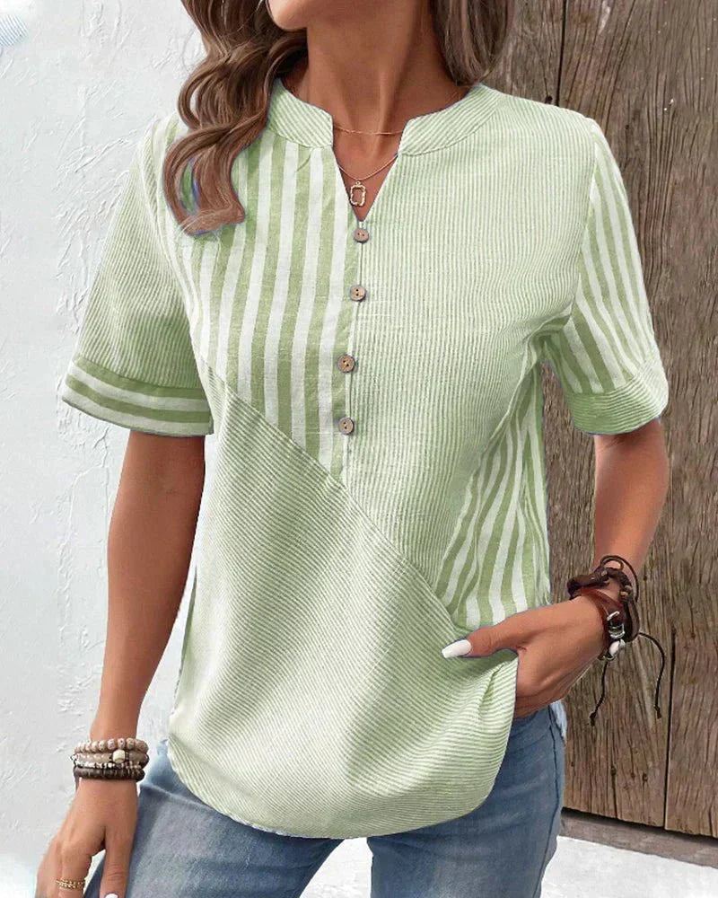 Stylish women's striped blouse, soft and breathable, perfect for an elegant yet casual ensemble.