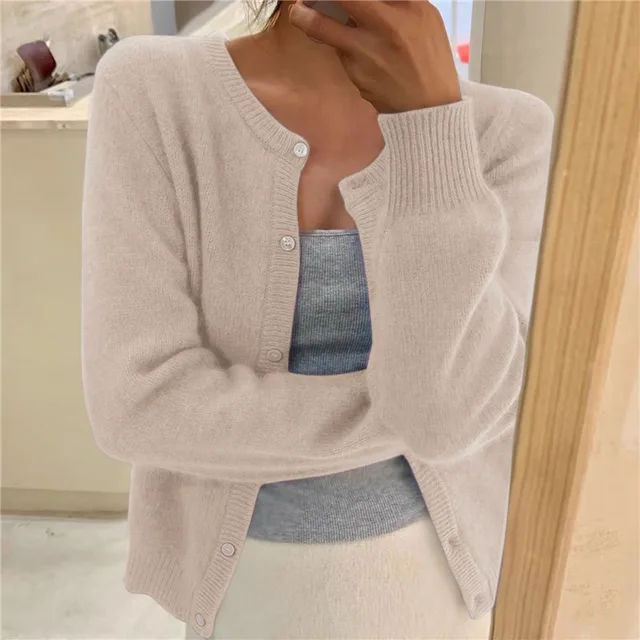 Comfortable & stylish women's solid knit cardigan, a cozy fashion knitwear essential.