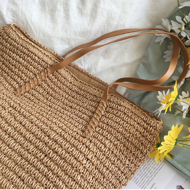 Stylish women's woven shoulder bag, roomy design for daily essentials, versatile brown finish.