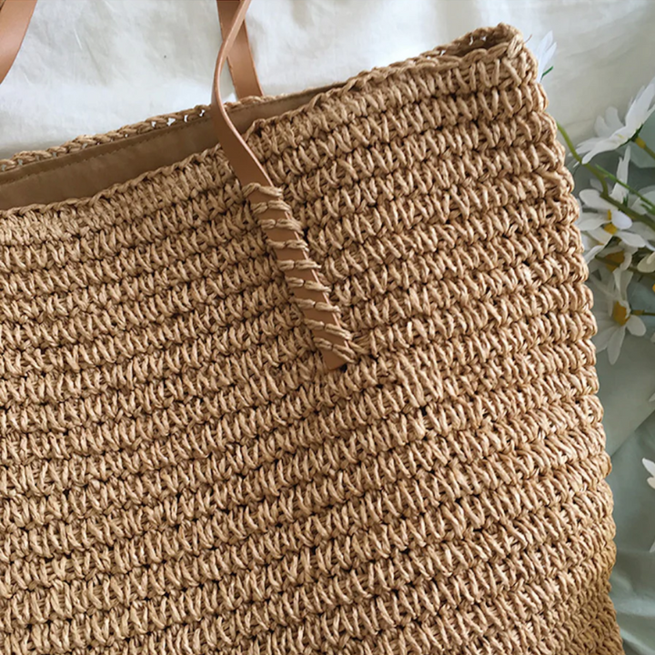 Elegant TerraWoven handbag for women, spacious interior & strong shoulder strap, perfect for daily use.