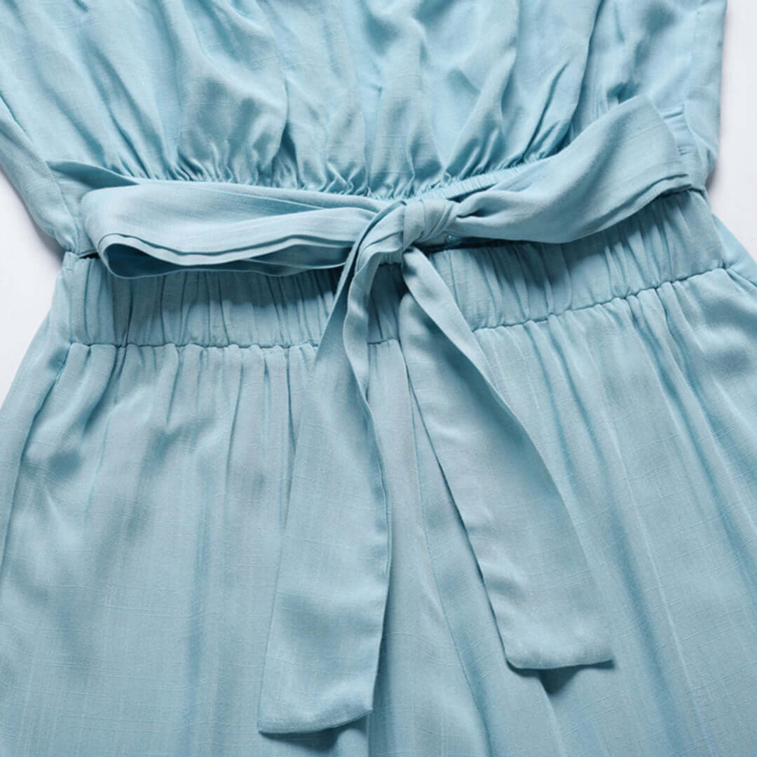 Casual women's strapless poly jumpsuit with elastic waist, ideal for warm weather.
