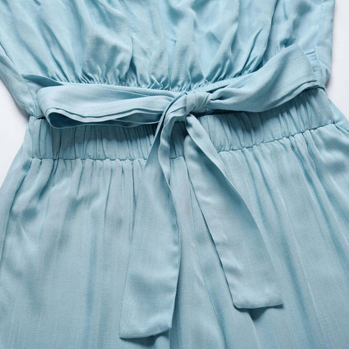 Casual women's strapless poly jumpsuit with elastic waist, ideal for warm weather.